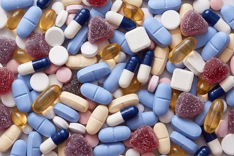 An assortment of sleep aid pills, capsules and gummies